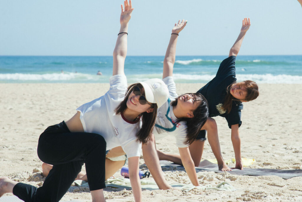 Yoga on beach Mindroom Innovation